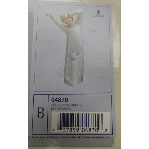 45 - Lladro - girl with candle & Boy Awakening/figures - boxed/no damage