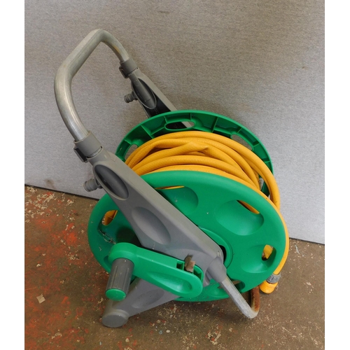 521 - Garden hose on reel