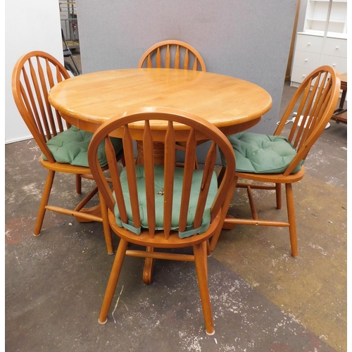 570 - Circular dining table and 4 chairs