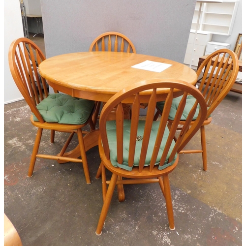 570 - Circular dining table and 4 chairs