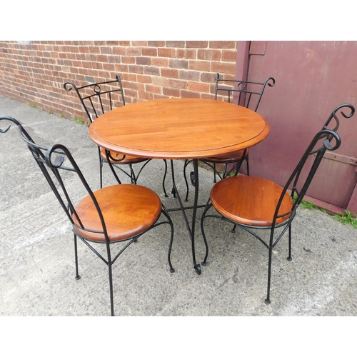 820 - Metal based dining table and four chairs