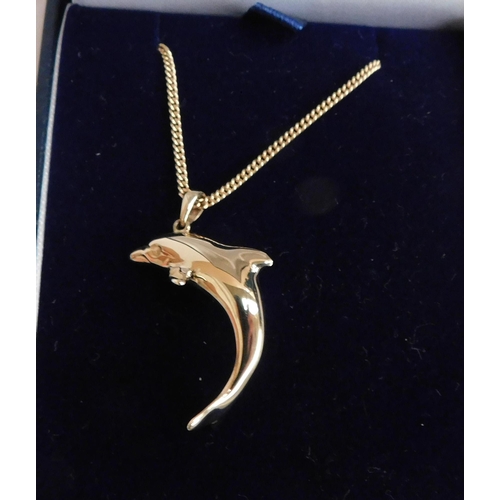 126 - 9ct gold - dolphin pendant & chain