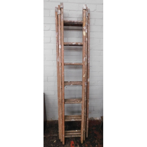 558 - Three piece extending wooden ladders - 7 rung