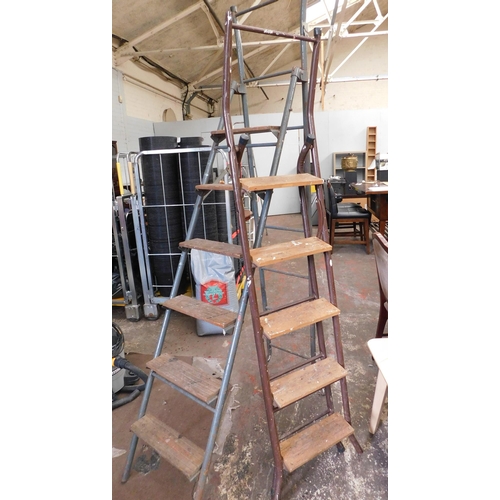 559 - Two metal and wooden stepladders (as seen)