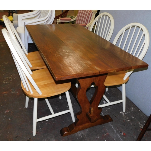 579 - Solid oak dining table and four farmhouse style chairs