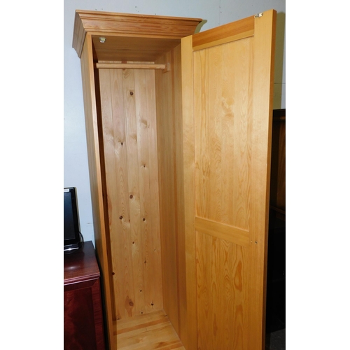 587 - Solid pine slimline wardrobe/cloakroom cupboard