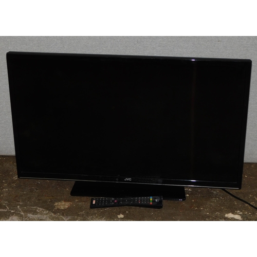 694 - JVC flat screen TV W/O - with remote