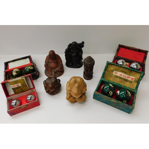 70 - Oriental items including Buddha figures & meditation balls