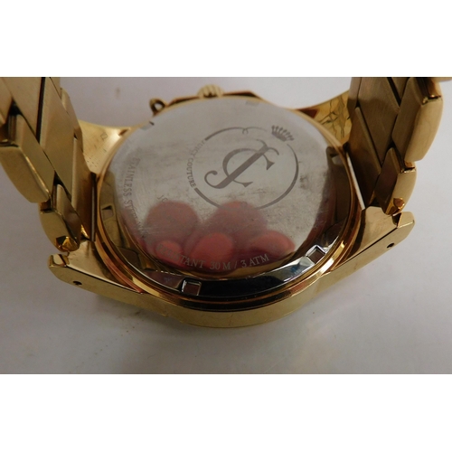 103 - Juicy Couture gold coloured dress watch W/O - needs battery