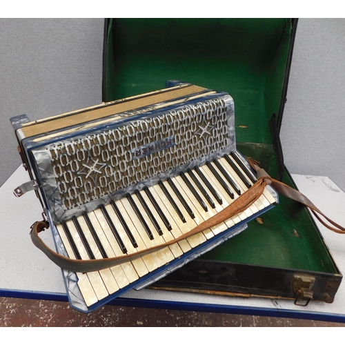 24 - Cased Hohner Tango IV accordion