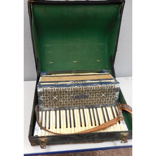 24 - Cased Hohner Tango IV accordion