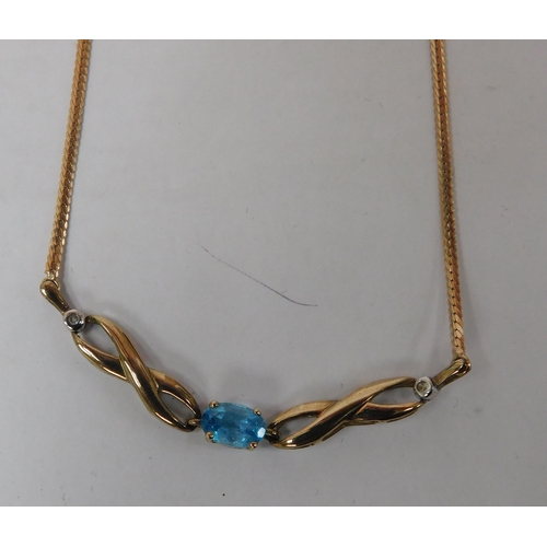 127 - 9ct Gold blue topaz and diamond necklace - weight 3.05g