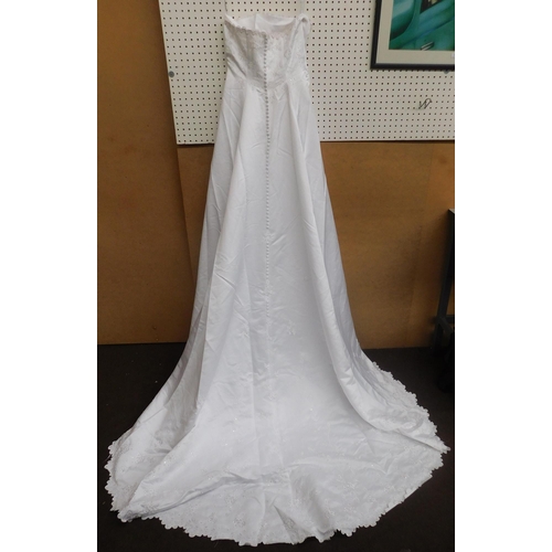 21 - Mary's White full length strapless wedding gown, long scalloped beaded and embroidered train, button... 