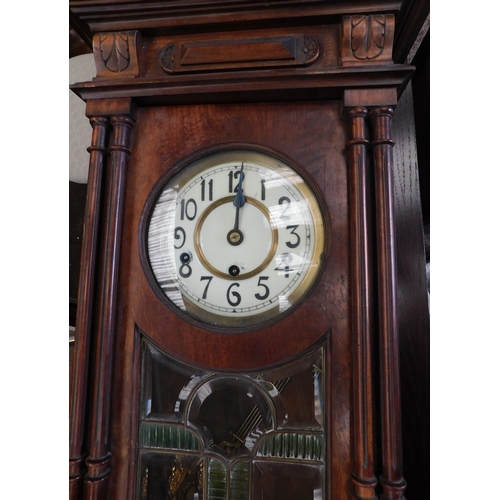 23 - Antique wall clock with bevelled glass front W/O with key and pendulum (key in office)