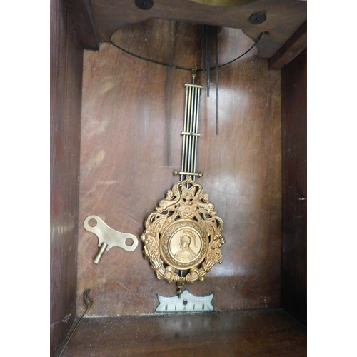 23 - Antique wall clock with bevelled glass front W/O with key and pendulum (key in office)
