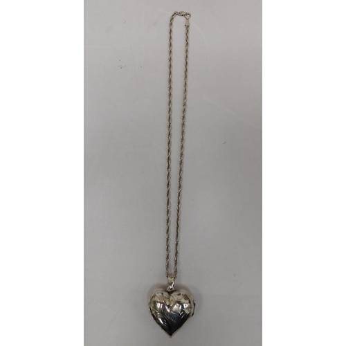 124 - 925 Silver large heart locket on silver twist chain - weight 22.14g