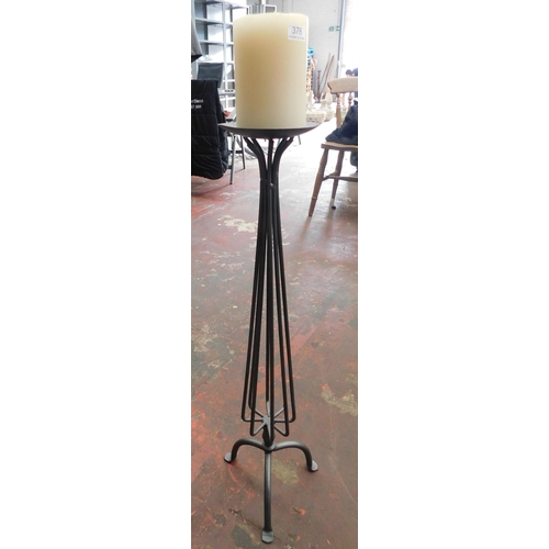 376 - Wrought iron candle stand and candle - approx. 31