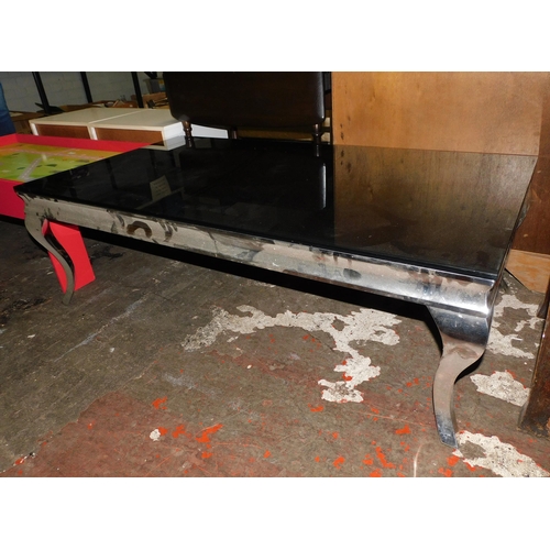 453 - Glass topped rectangular coffee table - approx. 51