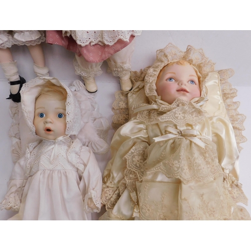 82 - Four porcelain dolls - no boxes