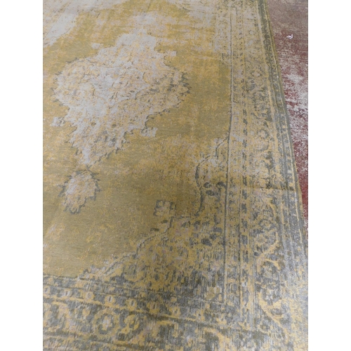 326 - Large NEXT vintage distressed style rug (195cm x 285cm)