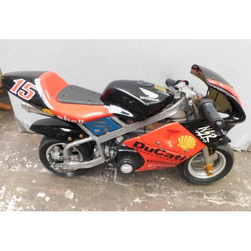 412 - Unused Honda Mini - Motorbike in working order. 49cc in red and black