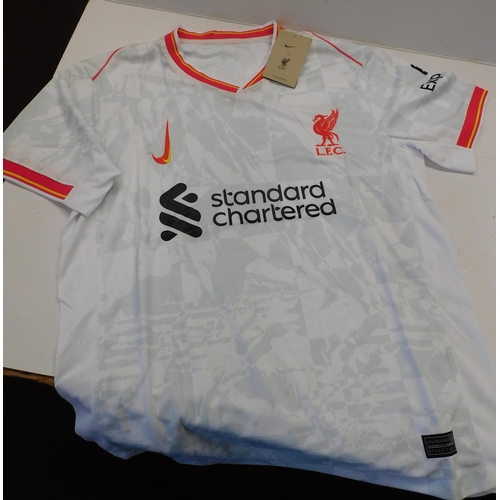 109 - Liverpool football shirt with labels - size M