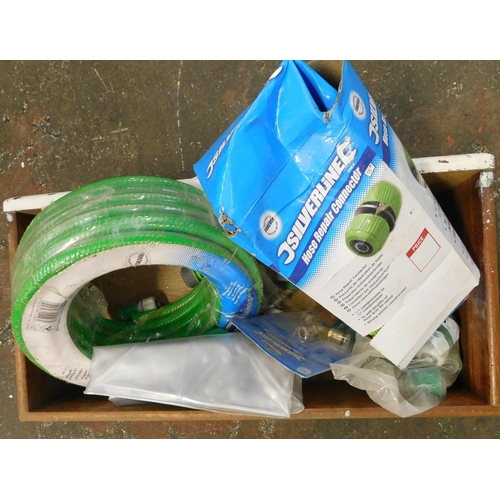 17 - Box containing garden hose and accessories