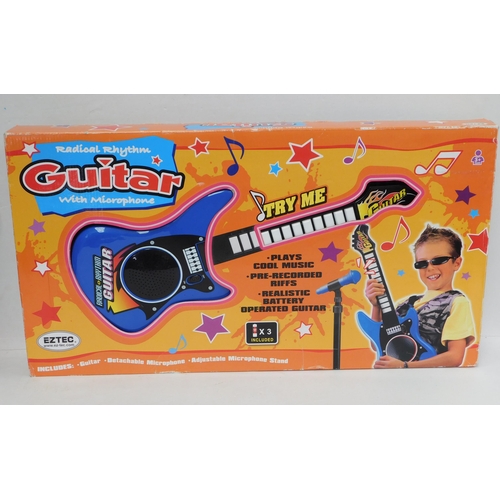 21 - Radical rhythm kid's guitar with microphone W/O