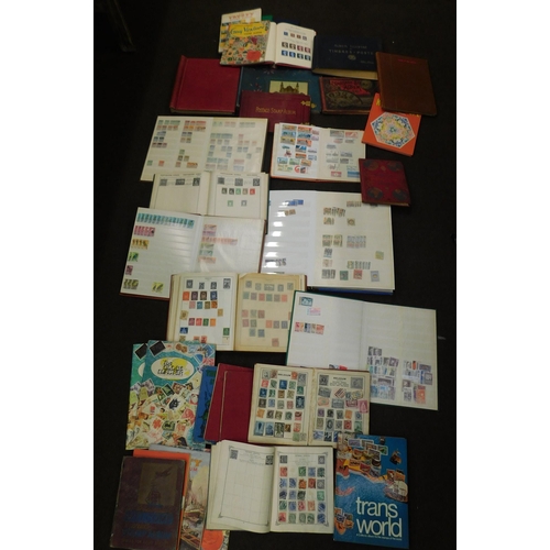 551 - Heavy box containing 25 stamp albums/stock book