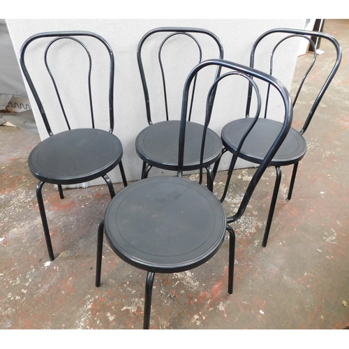 260 - Set of four black plastic and metal dining chairs