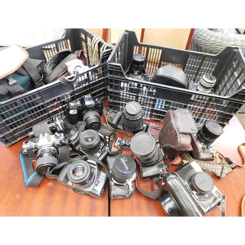 67 - 2 boxes of mainly SLR cameras including Canon, Minolta, Pentax etc.