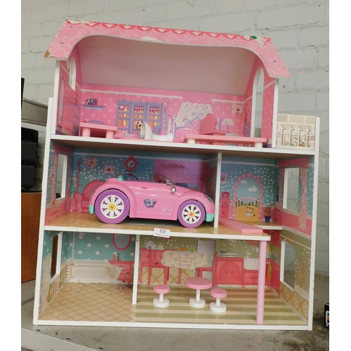 69 - Large dolls house with accessories