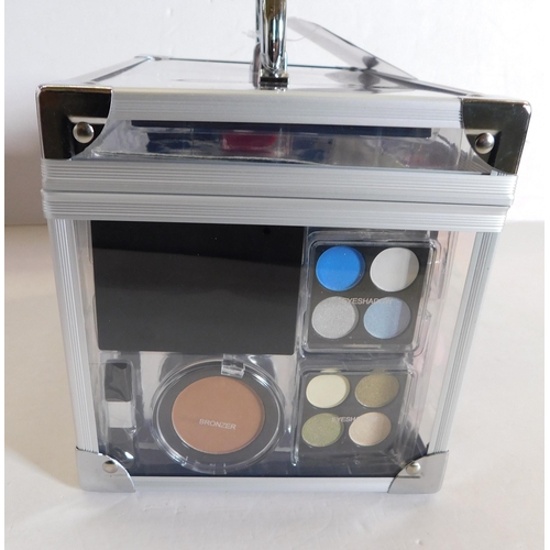 71 - New in box Elite handy cosmetic case and contents