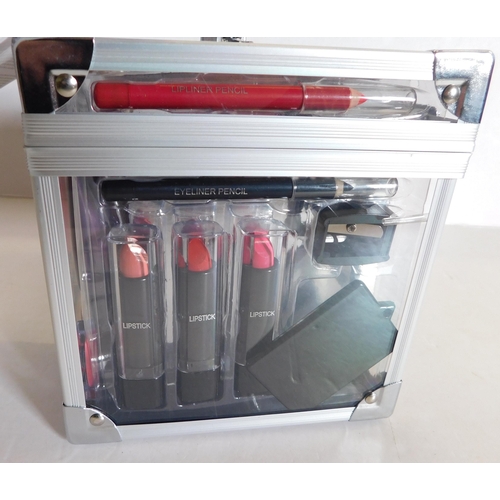 71 - New in box Elite handy cosmetic case and contents