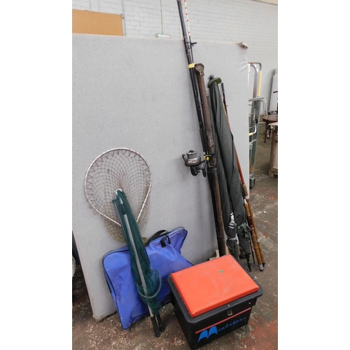 85 - Large collection of fishing rods, umbrellas, tackle box etc.