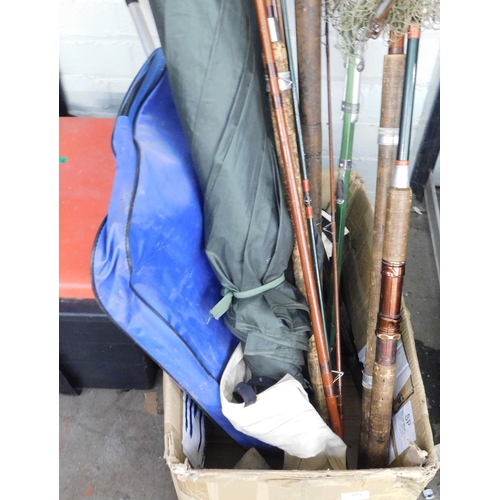 85 - Large collection of fishing rods, umbrellas, tackle box etc.