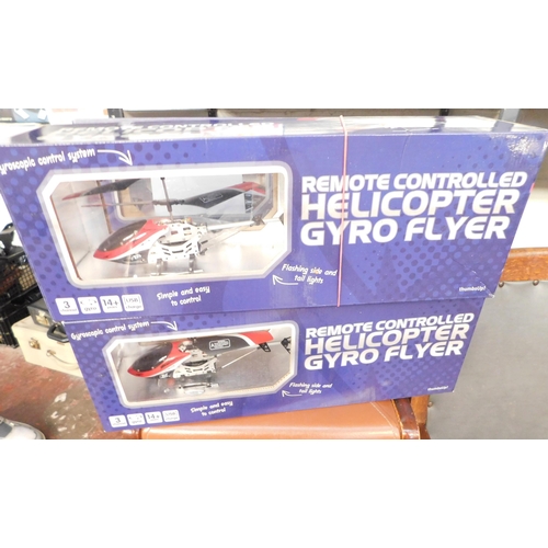 88 - Two remote helicopters - boxed/unchecked
