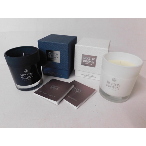 284 - Two Molton Brown single wick candles - Russian Leather and Coco & Sandalwood