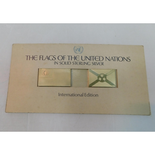 369 - Two silver hallmarked ingots - Flags of the United Nations