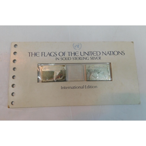 377 - Two silver hallmarked ingots - Flags of the United Nations