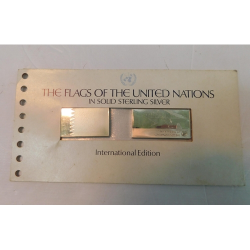 399 - Two silver hallmarked ingots=- Flags of United Nations