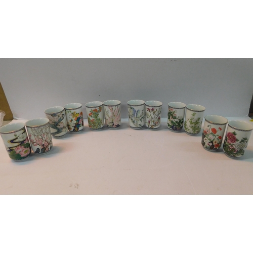 429 - 12 Japanese drinking vessels - porcelain