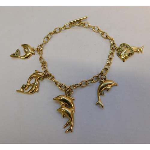 479 - Gold tone dolphin charm bracelet