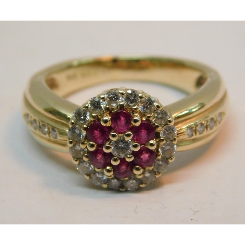 489A - 14K Gold ring set with ruby's (6) and diamonds (23) RRP £1000 - combined weight 6.66g