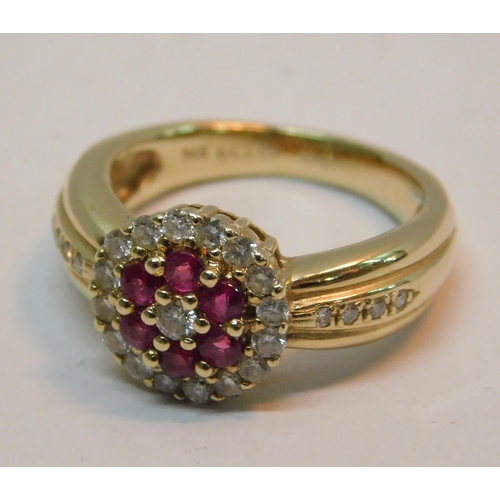 489A - 14K Gold ring set with ruby's (6) and diamonds (23) RRP £1000 - combined weight 6.66g