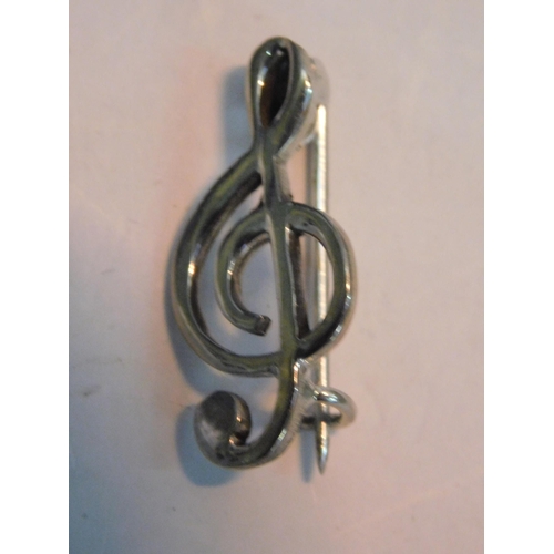 503 - Silver clef brooch