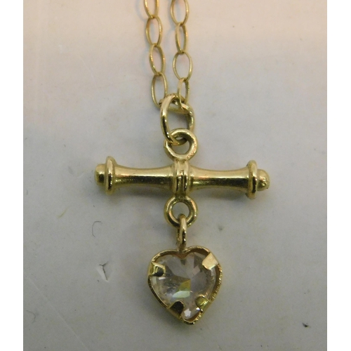 504 - 9ct Gold chain with T-bar and heart pendant - weight 1.5g