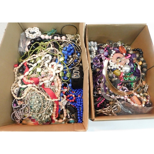 55 - 2x boxes of unsorted costume jewellery