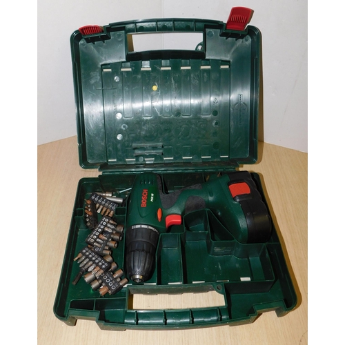 579 - Bosch battery drill with case & accessories (no charger - unchecked)