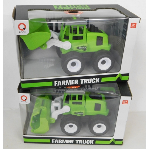 75 - 2x new/sealed farmer trucks